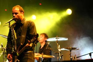 Chris Wolstenholme (baixo) e Dominic Howard (bateria), Muse